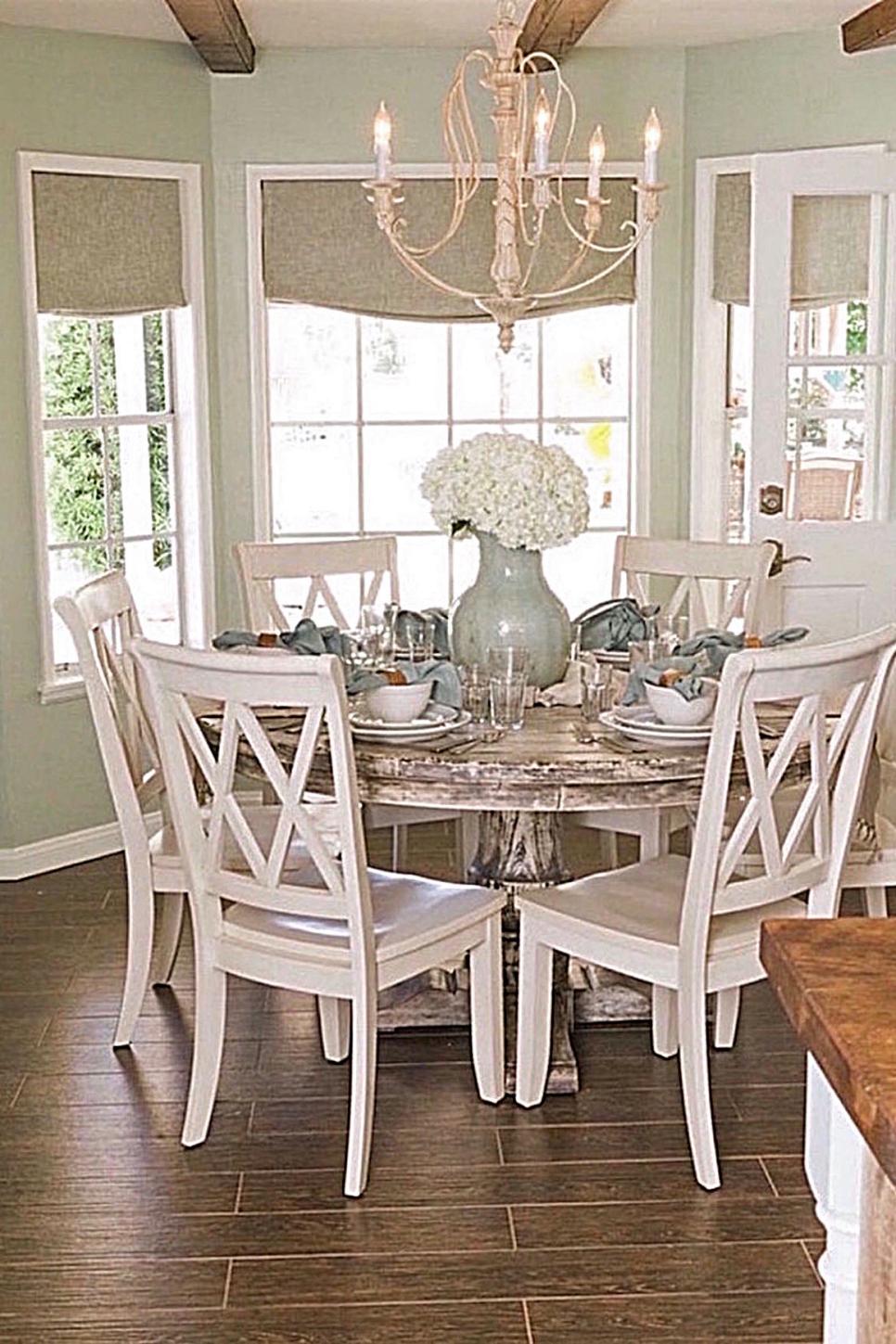 Eat-In Country Kitchen With Round Dining Table and Hardwood Floors | HGTV