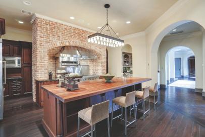 Chef Kitchen With Exposed Brick Wall Hgtv