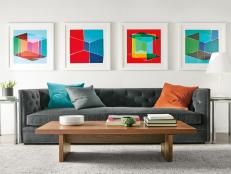 Gray Sofa with Framed Artwork
