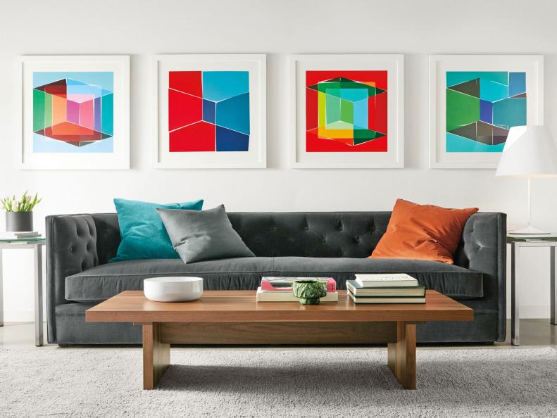 Gray Sofa with Framed Artwork