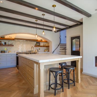 Chef Kitchen With Fireplace and Beams