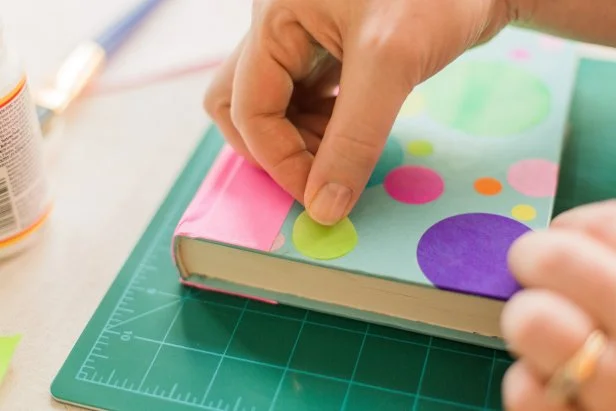 Randomly place tissue dots to create a fun pattern securing them with the glue.