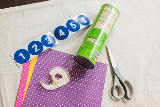 Materials & Tools Needed
Yoga Mat
10 chip cans
3 Pool Noodles
Small Ball
Decorative paper
Number stickers
Double sided tape
Toothpicks
Speed Square or Miter box
Serrated knife
