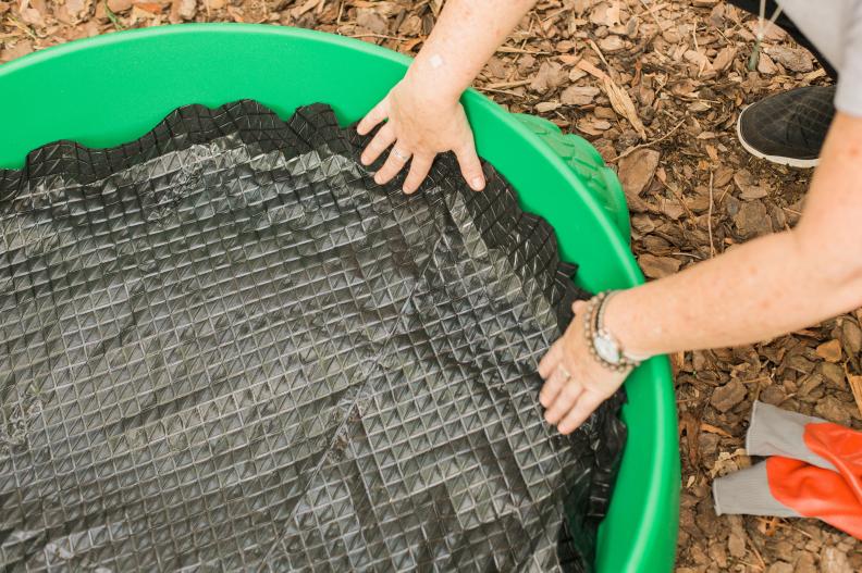Cut weed block material to size and lay down in the sandbox so that the bottom and sides are covered. This will help create a barrier and discourage any weeds attempting to make their way into the garden via drainage holes.