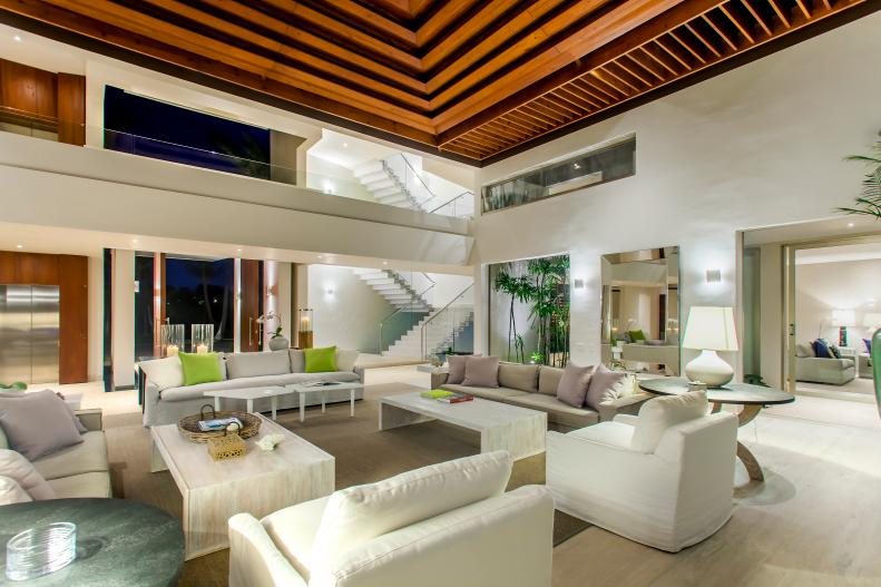 Contemporary White Living Room With Pitched Ceiling