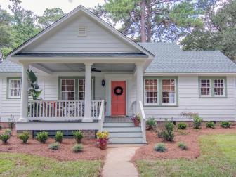 The exterior of the Mathews house now has an inviting porch after a renovation by Ben & Erin, as seen on Home Town.