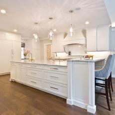 Large White Central Kitchen Island With Breakfast Bar