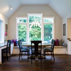 Dining Nook With Square Arch and Banquette Window Seat