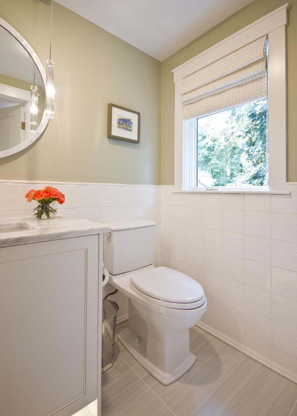 Guest Bathroom With Taupe Walls and White Tile Backsplash | HGTV