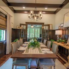 Rustic Brown Dining Room with French Doors