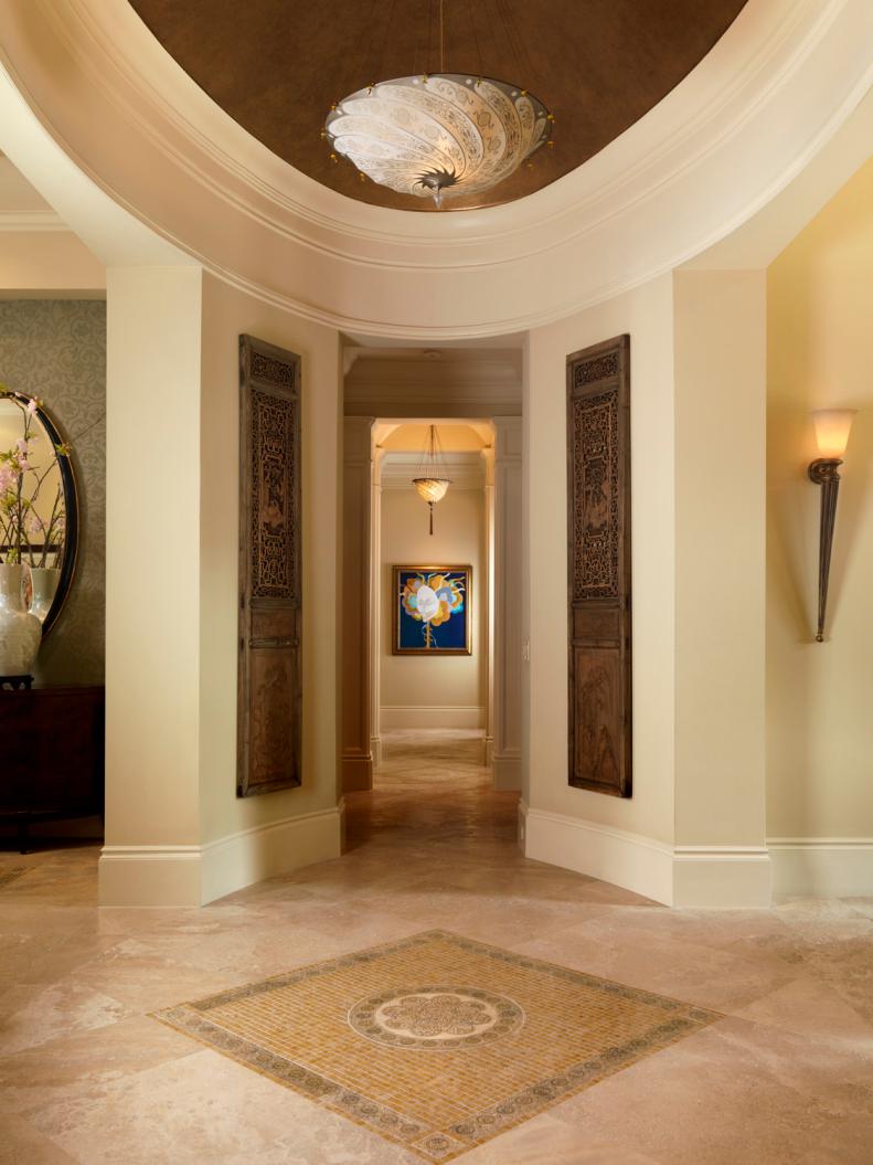 Neutral Foyer With Dome Ceiling and Marble Tile Floors