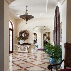 Light and Bright Foyer With Decorative Arched Doorways