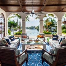 Breezy Covered Porch With Tropical Waterfront View