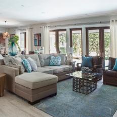 Transitional Open Plan Living Room With Sectional and Blue Accents