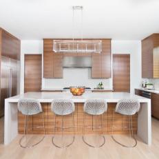 Light and Bright Modern Kitchen With Stylish Metallic Stools