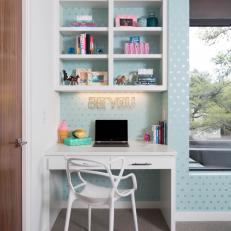 Teen Girl's Bedroom With Homework Nook and Blue Geometric Wallpaper