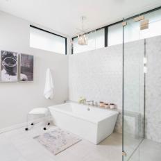 Modern Master Bathroom With Freestanding Bathtub and Glass Enclosed Shower 