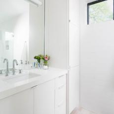 White Guest House Bathroom With Hexagon Tile Floor