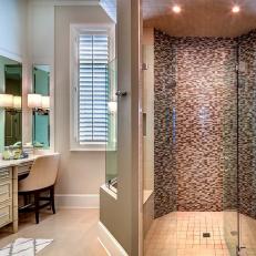 Master Bathroom With Beauty Vanity and Glass Enclosed Shower Stall