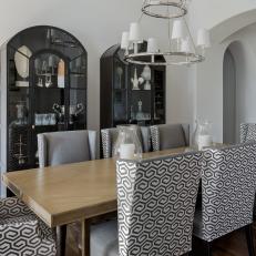 Transitional Dining Room With Stylish Gray and White Upholstered Chairs