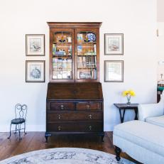 Vintage Prints Displayed in a Modern Grouping in Family Room