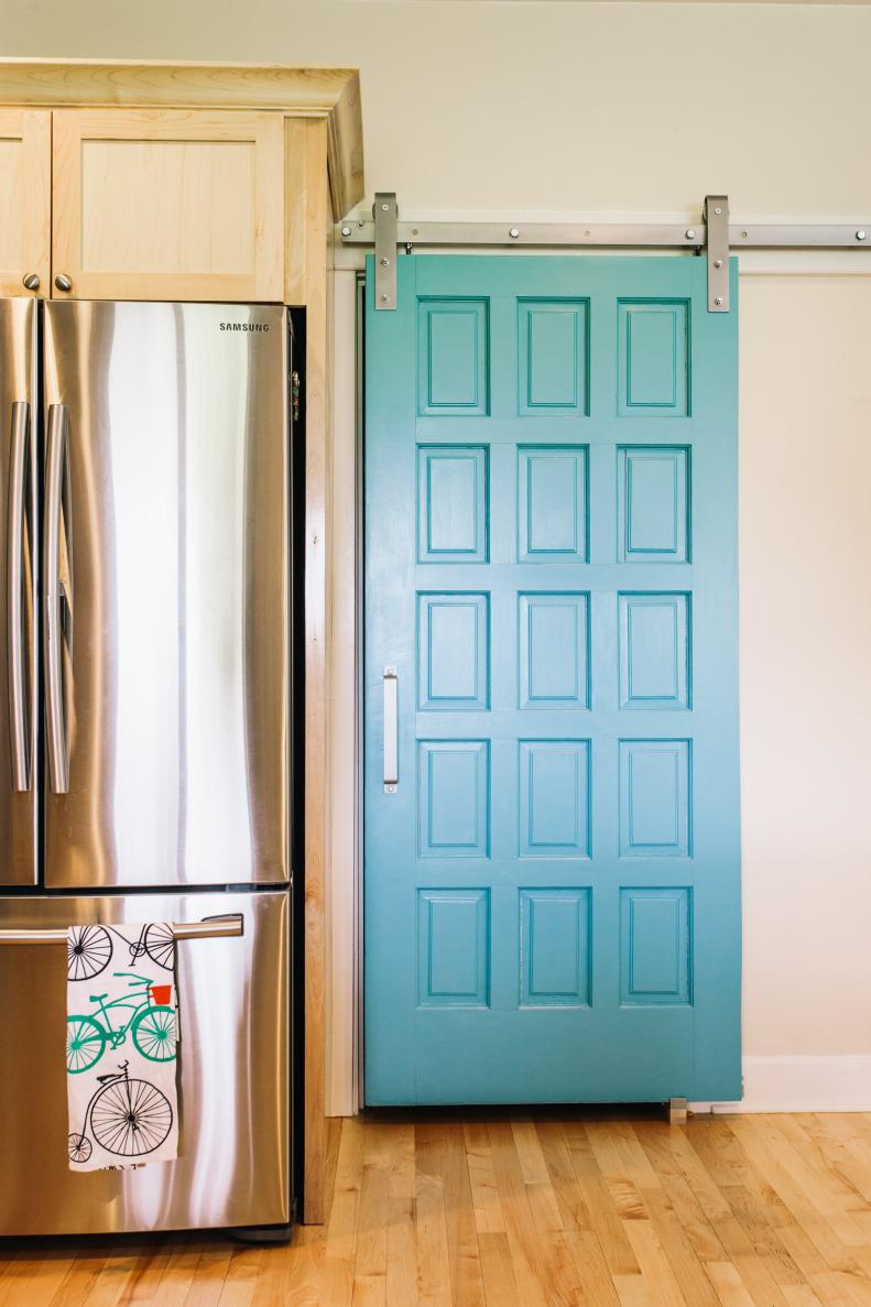 Kitchen with Turquoise Barn Door