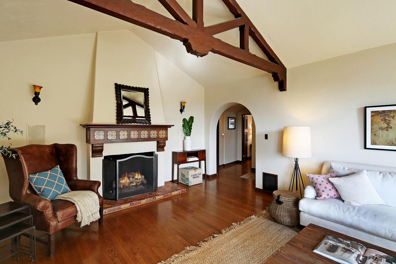 Fireplace With Warm Wood Mantel And Spanish Inspired Hearth Hgtv