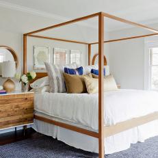 Contemporary Bedroom With Poster Bed and Blue, White Color Palette