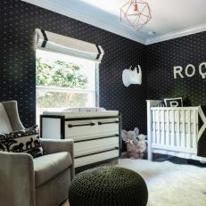 Comfortable Rocking Chair and Pouf Footstool in Black and White Nursery