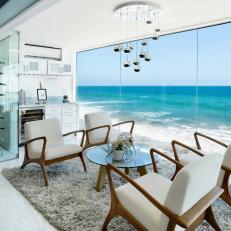 Glass-Walled Sitting Room with Wine Cellar