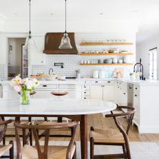 White Open Kitchen and Dining Table