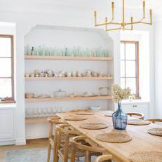 Country Dining Room With Blue Glass Vase