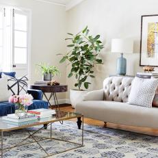 Blue and White Living Room With White Sofa