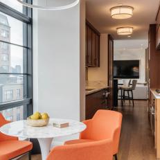 Urban Breakfast Nook with Cheerful Chairs