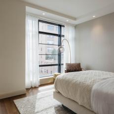 Cream and Gray Bedroom in City Apartment