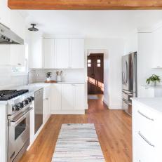 White Transitional Kitchen With Exposed Beam