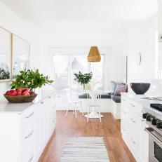 White Eat-In Kitchen With Banquette