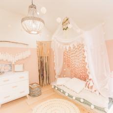 Pink Eclectic Nursery With Canopy Bed, Wall Hangings
