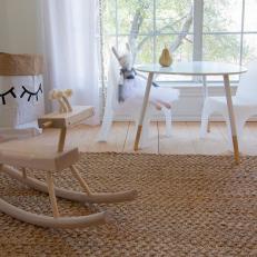 Contemporary Neutral Kids Room With Rocking Horse
