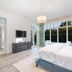 Blue and White Master Bedroom With French Doors