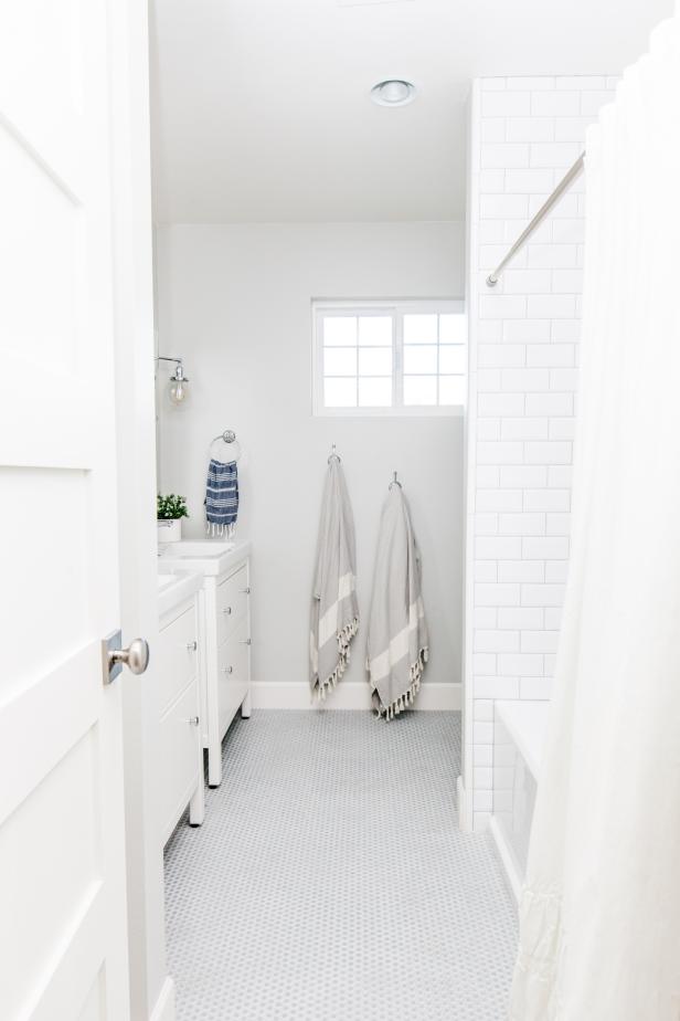 Classic White Bathroom With Subway Tile Shower | HGTV