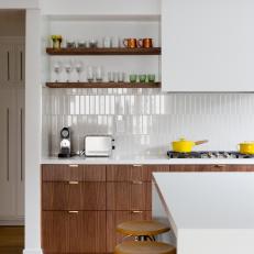 Contemporary Kitchen Mixes Clean Whites and Warm Woods
