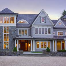 Luxury Exterior at Night and Gravel Drive