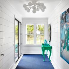 Tropical Hallway With Blue Rug