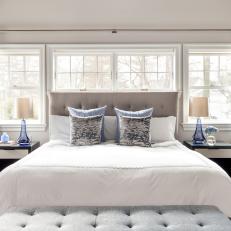 Bed With Gray Upholstered Headboard and Bench