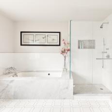 Master Bathroom With Marble Surround Tub and Glass Shower