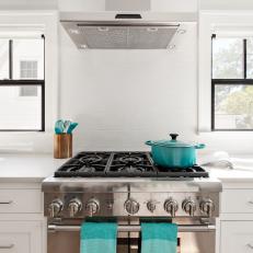 White Kitchen With Stainless Steel Stove
