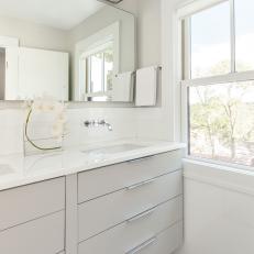 White Master Bathroom With Marble Floor