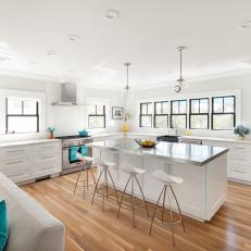 White Open Plan Kitchen With Blue Accents