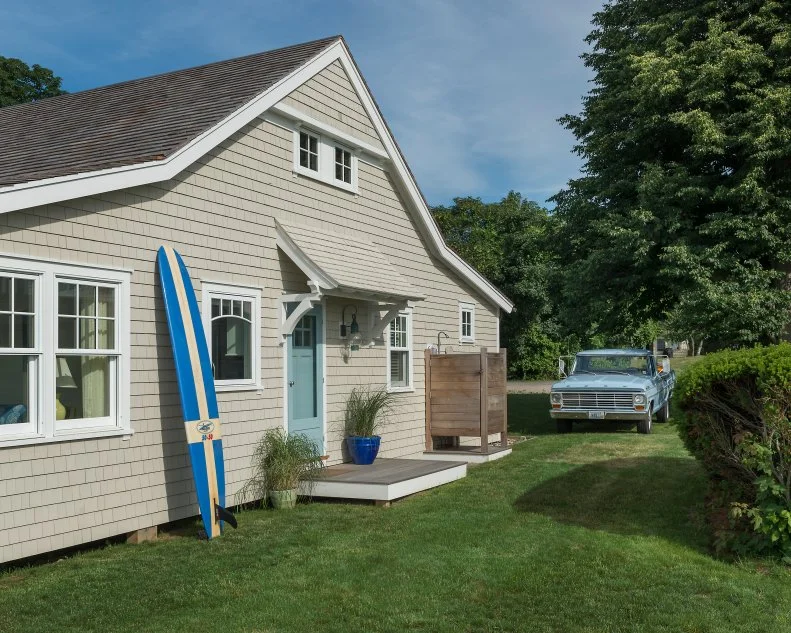 Beach Home's Exterior with Robin's Egg Blue Door